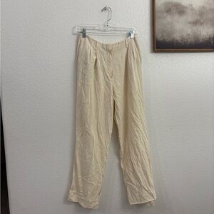 The Row 6 Cream High-Waist Pleated Wide-Leg Trousers